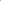 Hand holding a chewable tablet with watermelon flavor on an orange background