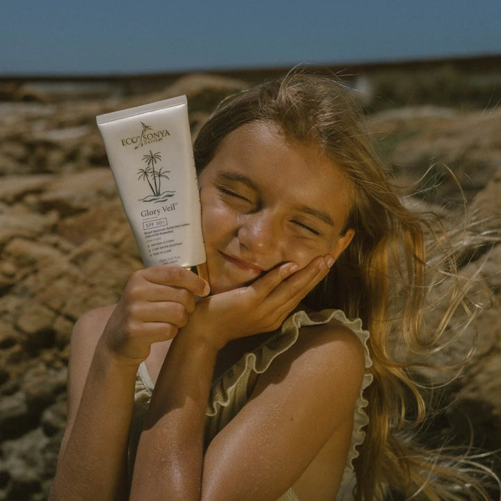 Eco Tan Glory Veil 150ml Sunscreen 50 SPF with young girl