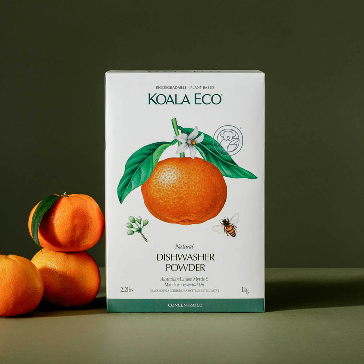 Koala Eco dishwasher powder box with oranges on a green background