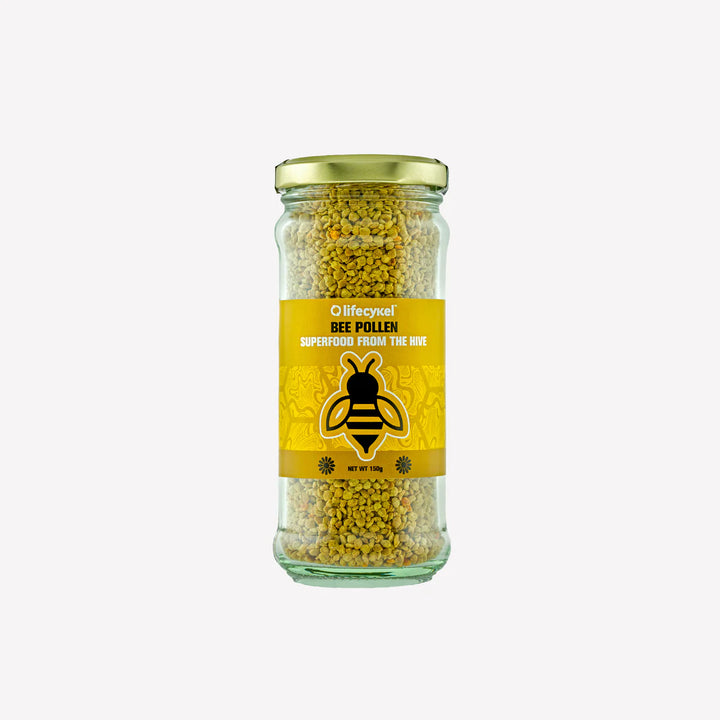 Jar of bee pollen with a yellow label on a white background