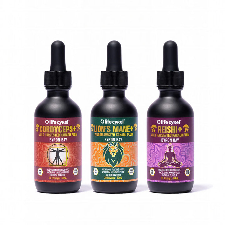 Three bottles of Olife cykel supplements with colorful labels on a white background