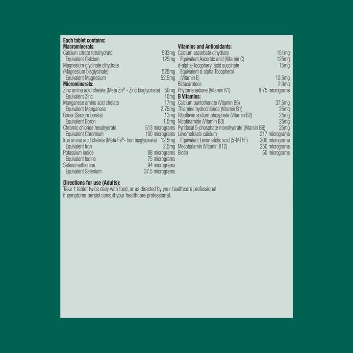Vitamins and minerals supplement label with detailed information on a green background