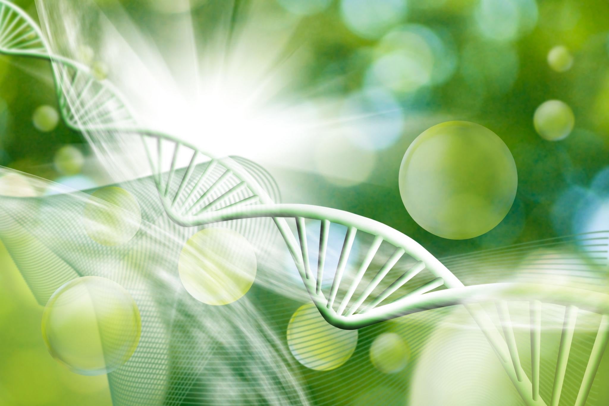 DNA double helix with a green, nature-themed background