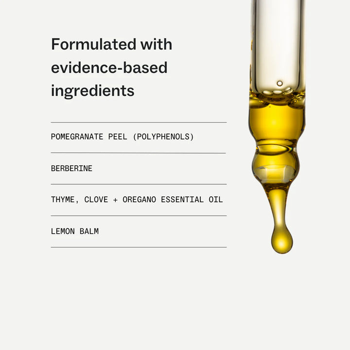 Bottle of oil with a droplet and list of ingredients on a white background