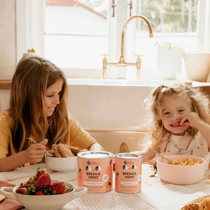 Nutra Organics Brekkie Hero with two little girls at breakfast table