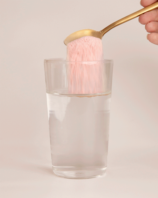 Nutra Organics Collagen Beauty with Verisol And Vitamin C Watermelon Strawberry stirring into water
