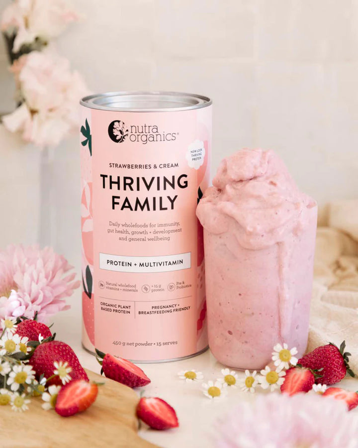 Nutra Organics Thriving Protein Strawberry & Cream with drinks