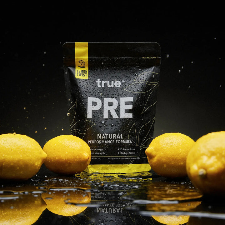 true PRE supplement package with lemons on a reflective surface