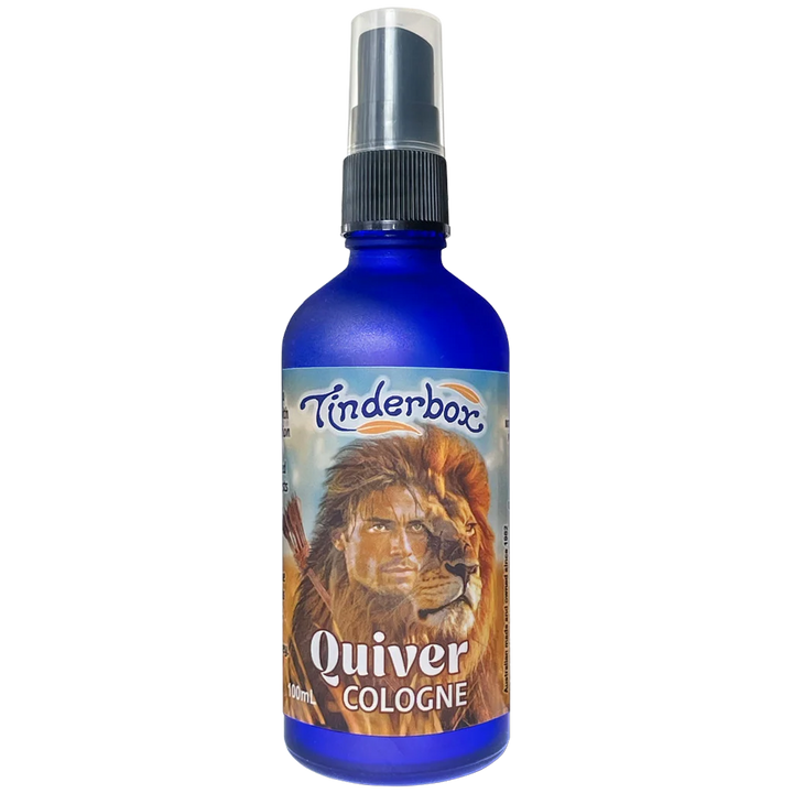 Blue bottle of Tinderbox Quiver Cologne with a label featuring a man and lion.
